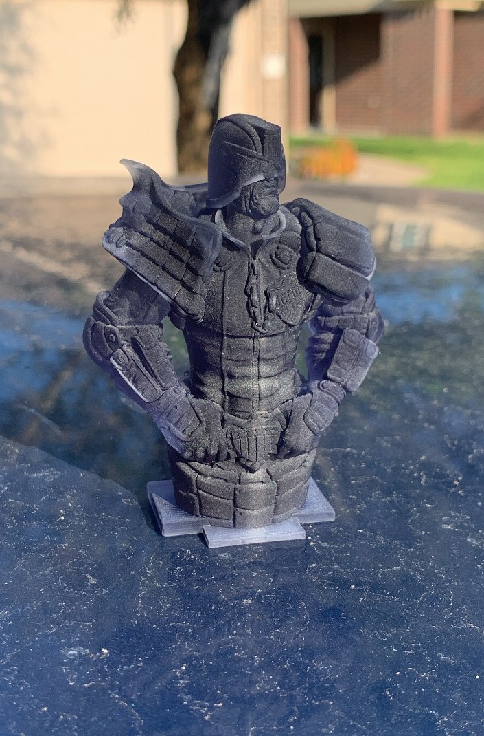 Armored character bust printed in dark filament