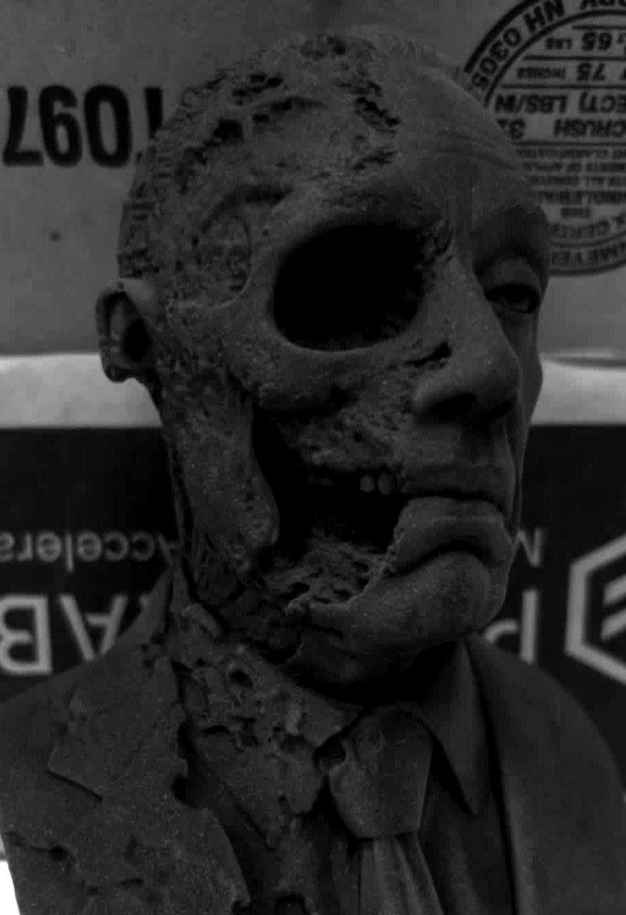 Gustavo Fring bust with a skull-inspired design, featuring exposed and wrapped facial textures.